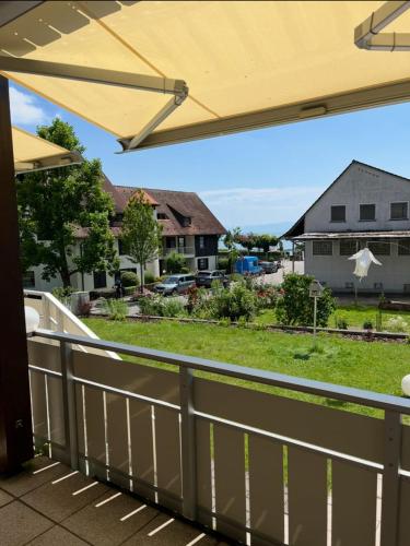 a view from the deck of a house at STAYS Hafenblick direkt am See in Hagnau