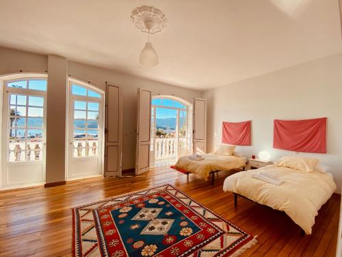 Ένα ή περισσότερα κρεβάτια σε δωμάτιο στο Alameda House