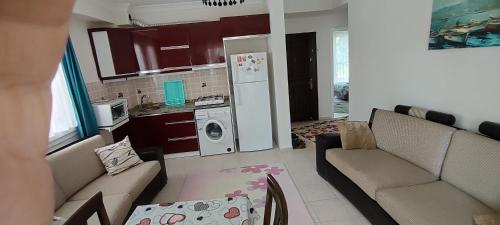 Η κουζίνα ή μικρή κουζίνα στο çileks apart otel