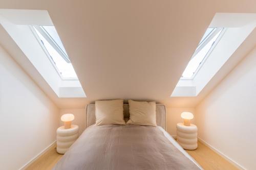 Postel nebo postele na pokoji v ubytování Modernes Apartment in Langenbach bei München, nahe Flughafen München