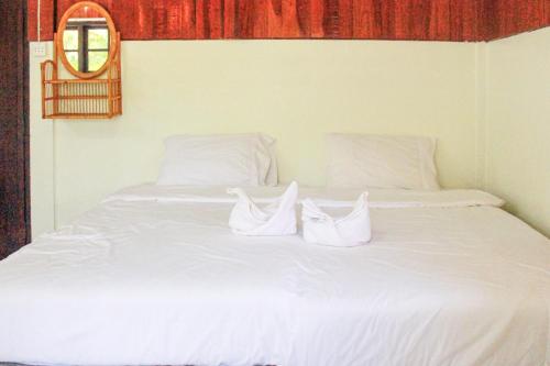 Postel nebo postele na pokoji v ubytování Saksupha Resort