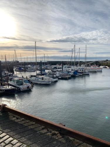a group of boats docked in a harbor at New Holliday Villa, Anstruther in Cellardyke