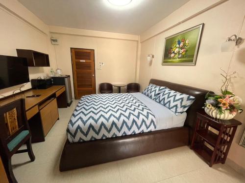 Ένα ή περισσότερα κρεβάτια σε δωμάτιο στο 66 Apartment