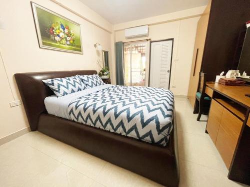 Ένα ή περισσότερα κρεβάτια σε δωμάτιο στο 66 Apartment