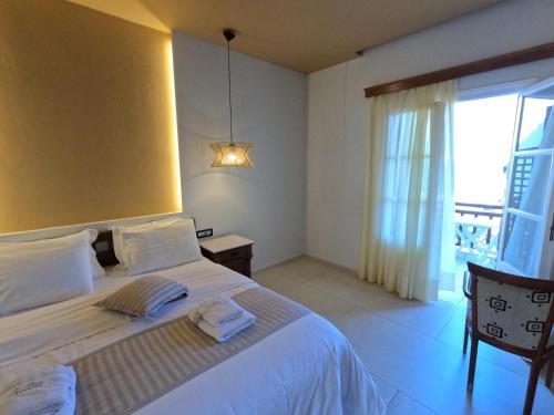 The Flower Of Monemvasia Hotelにあるベッド