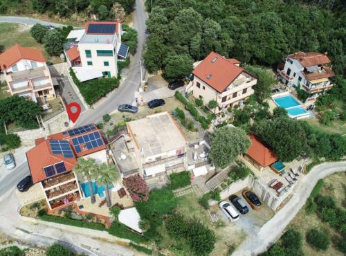 an aerial view of a house with a pool at Holiday Home Boni in Rab