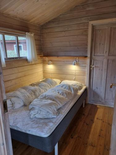 Postel nebo postele na pokoji v ubytování Feriebyens Camping