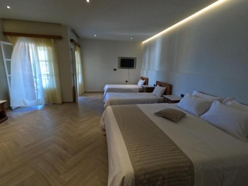 The Flower Of Monemvasia Hotelにあるベッド