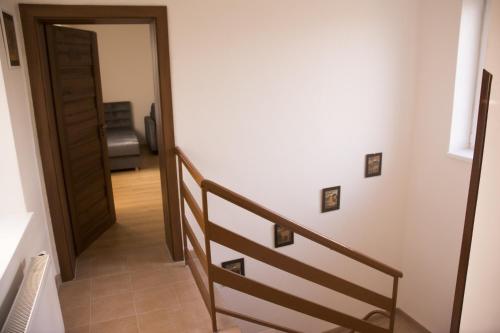 a hallway with a stairway leading to a room at Ubytovanie U Mirca in Nová ľubovňa