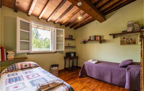 Cama o camas de una habitación en 2 Bedroom Lovely Home In Montecastello
