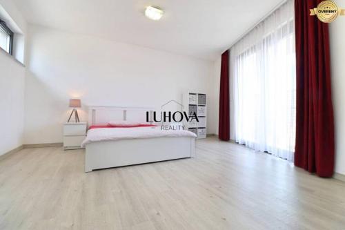 Posteľ alebo postele v izbe v ubytovaní Luxusný rodinný dom v Trenčíne