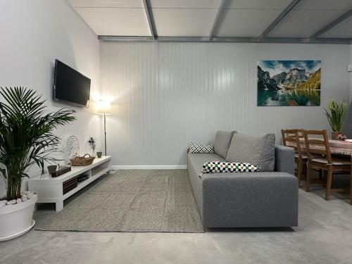 Et tv og/eller underholdning på Piscina climatizada