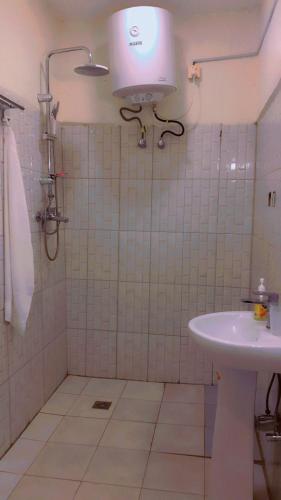Un baño de Ibirunga Apartment View