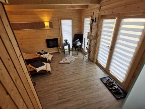 an overhead view of a room with wooden walls and windows at Wohnung Balko in Simmerath
