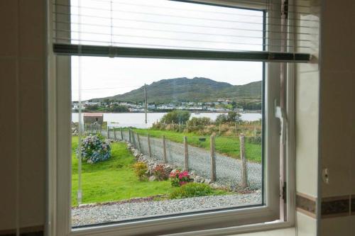 a window with a view of a body of water at 17 Mountaindale in Tullaghan
