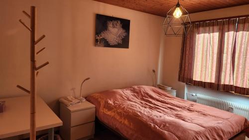 Postel nebo postele na pokoji v ubytování B&B St Moritz