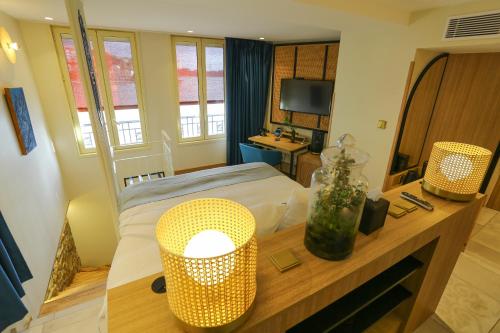 Postel nebo postele na pokoji v ubytování Splendid Hôtel & Spa