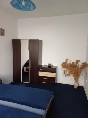 Ένα ή περισσότερα κρεβάτια σε δωμάτιο στο garsoniera cu bucătărie, Iulius Mall