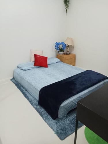 Katil atau katil-katil dalam bilik di Peaceful Retreat in Prime Sydney