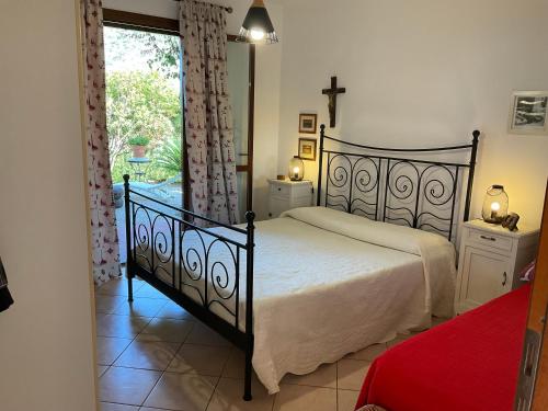 Postel nebo postele na pokoji v ubytování Villino il limone