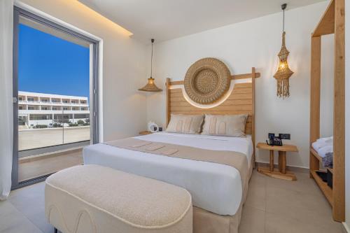 Кровать или кровати в номере Cabana White Boutique Hotel & Suites
