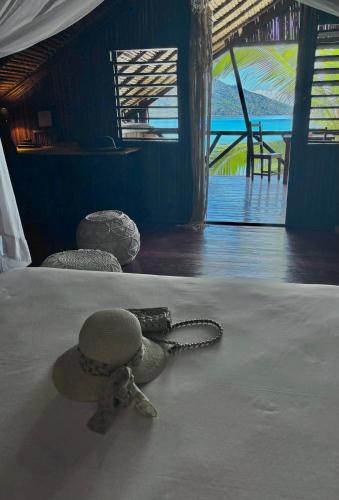 Postel nebo postele na pokoji v ubytování Madabay's Lodge Nosy Be