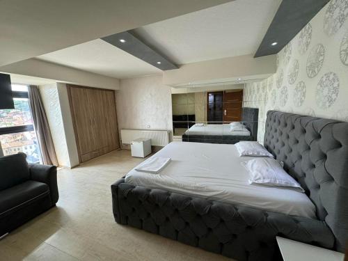 Katil atau katil-katil dalam bilik di Hotel Pashtriku