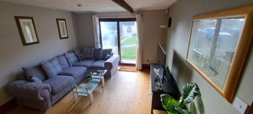 Posezení v ubytování Cozy 1 bed with countryside views near Peterborough