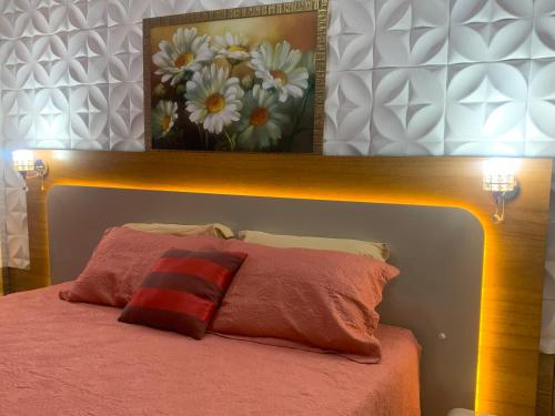 Una cama o camas en una habitación de Pousada Cascata dos Amores
