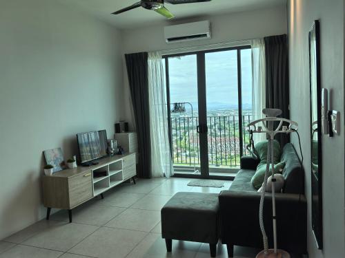 Μια τηλεόραση ή/και κέντρο ψυχαγωγίας στο Platinum Suite Meritus by Moowin