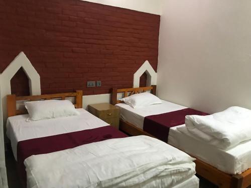 Postel nebo postele na pokoji v ubytování Mount Fuji Homestay