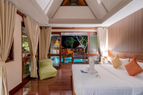 Postel nebo postele na pokoji v ubytování Baan Duangkaew Resort