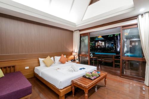 Postel nebo postele na pokoji v ubytování Baan Duangkaew Resort