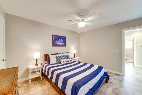 a bedroom with a bed and a ceiling fan at Fire Pit and Stunning Views Lake Eufaula Retreat! in Texanna