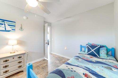a childs bedroom with a blue bed and a dresser at Fire Pit and Stunning Views Lake Eufaula Retreat! in Texanna