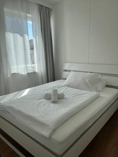 Una cama o camas en una habitación de Amazing sunny flat with a big terrace