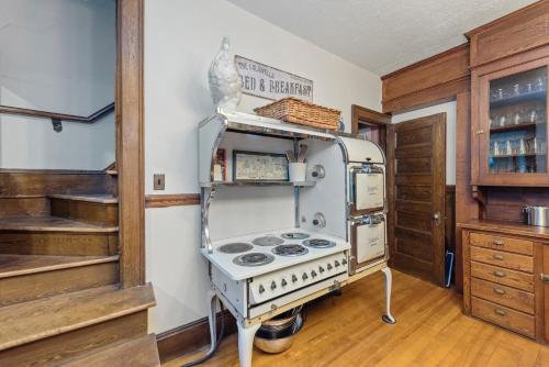 a kitchen with an old stove in a room at The Mulburn Inn in Bethlehem