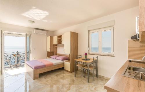 Posteľ alebo postele v izbe v ubytovaní Studio Apartment In Krvavica