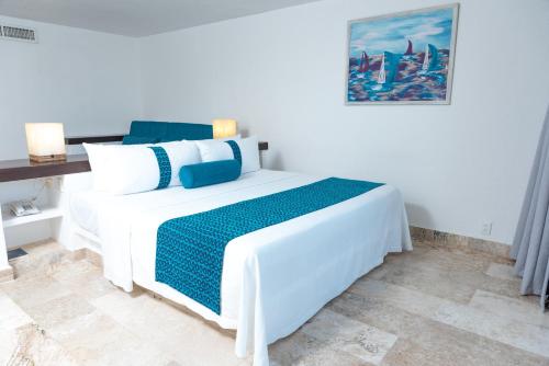 Ritz Acapulco All Inclusiveにあるベッド