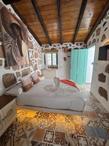Postel nebo postele na pokoji v ubytování Hacienda de las Indias, Cartagena