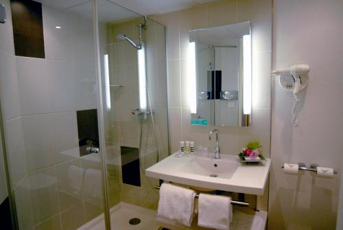 Ένα μπάνιο στο Mercure Abbeville Centre – Porte de La Baie de Somme