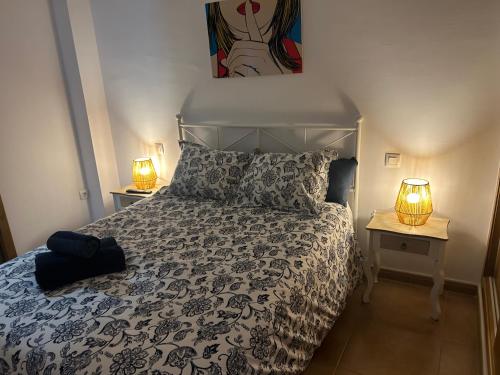 A bed or beds in a room at Palma 2 sueños