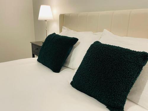Ένα ή περισσότερα κρεβάτια σε δωμάτιο στο Eastwood Lodge Apartment No6 Woodhall Spa