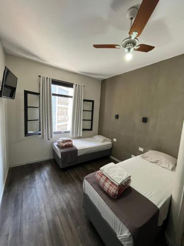Postel nebo postele na pokoji v ubytování Hostel Carabelas - Proximo a 25 de Março e Brás