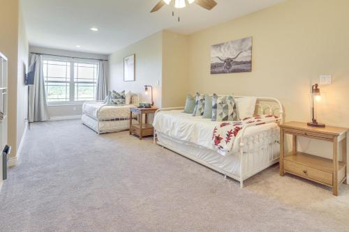 a bedroom with two beds and a window at Scenic Views, Fire Pit Texas Hill Country Getaway in Fischer