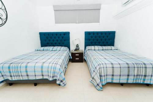Ein Bett oder Betten in einem Zimmer der Unterkunft Loft Sabalo - Pet Friendly