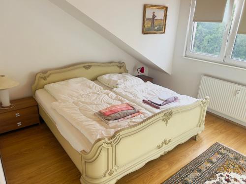 Katil atau katil-katil dalam bilik di Apartment mit schöner Aussicht auf den Großen Feldberg & Burg Königstein
