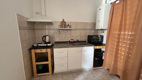 Kuchyň nebo kuchyňský kout v ubytování 760 C Apartamentos
