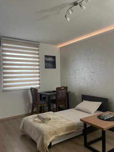 Postel nebo postele na pokoji v ubytování Apartman Silver Bg