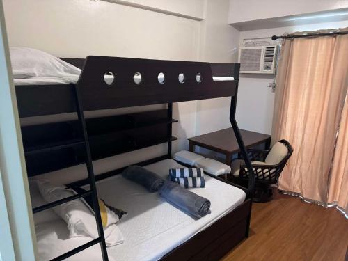 Postel nebo postele na pokoji v ubytování Vittoria Suites at Northpoint Pines Estate